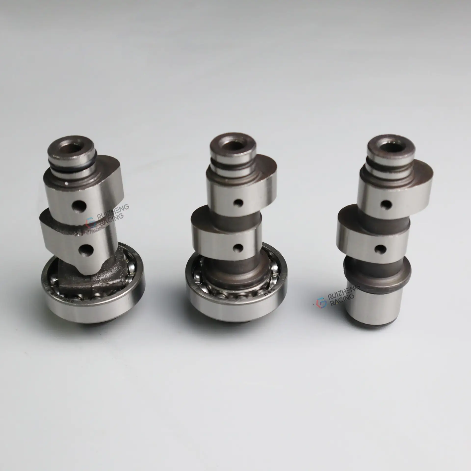 Complete set of Yamaha Mio camshafts – factory and racing models