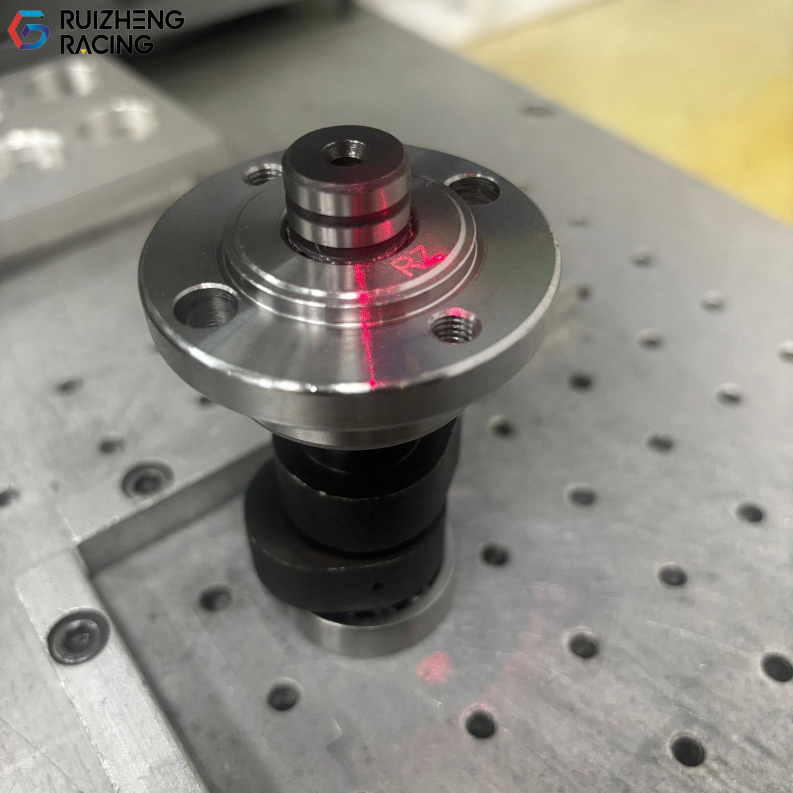 Close-up of a racing camshaft with custom marking and branding applied by Ruizheng Racing