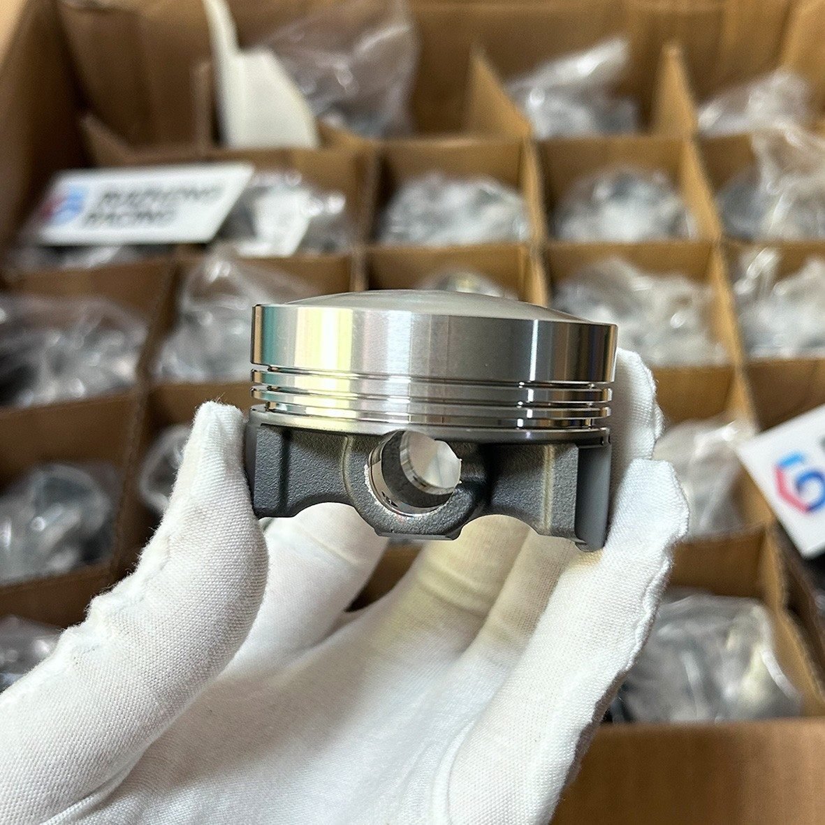 Dome Top Cast Piston front and pin bore detail